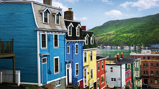 Street with colorful houses near ocean in St. John&s, Newfoundland, Canada