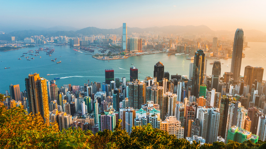 Hong Kong city skyline at sunrise from the Victoria peak