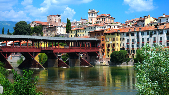 Bassano del Grappa is a city in northern Italyâ€™s Veneto region, Italy. The Old Bridge also called the Bassano Bridge or Bridge of the Alpini is considered one of the most picturesque bridges in Italy.