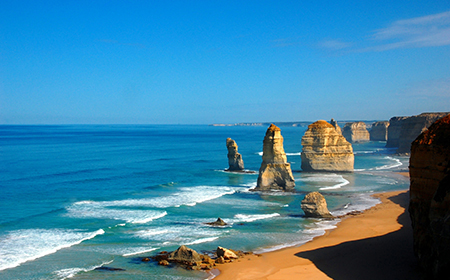 View of the beach and Twelve Apostles rock formations, found along the Great Ocean Road in Australia