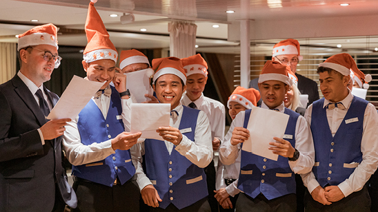 Amadeus Christmas crew singing